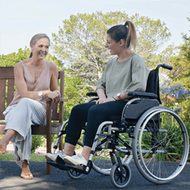 Woman in a wheelchair smiling